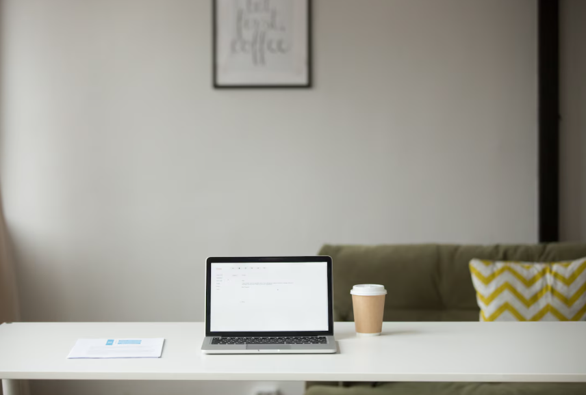 Choice fatigue search trends showing a clean desk with a laptop and coffee cup.